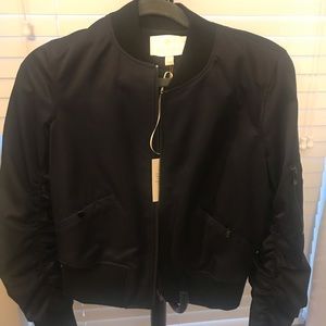 A cute navy jacket by Carlisle!